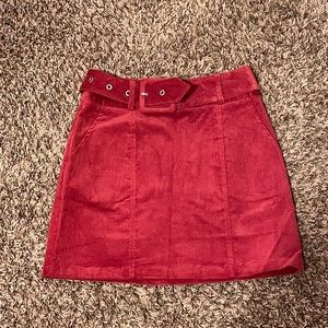 Brand new burgundy mini skirt from Louche London. US size 4